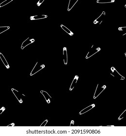 Safety pins black and white vector seamless pattern on black background.