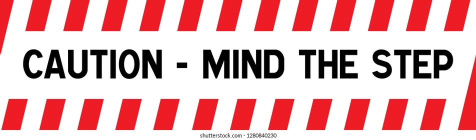 safety sign concept: Yellow and black warning sign on step stating "Mind the Step"