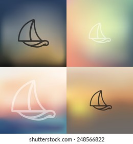sailboat icon on blurred background