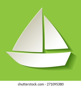 Sailboat paper white on green background  