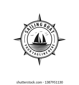 Sailing boat with ocean wave logo design