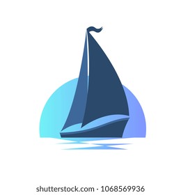 Sailing boat on the waves at sunset.