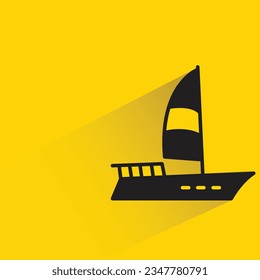 sailing boat with shadow on yellow background