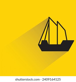 sailing ship with shadow on yellow background