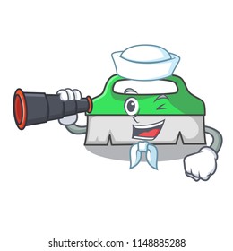 Sailor with binocular scrub brush mascot cartoon