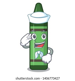 Sailor green crayon above character wooden table