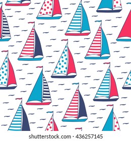 Sails in polka dots and stripes. Seamless pattern in cartoon style. Sailboats hand-drawn. Vector illustration.