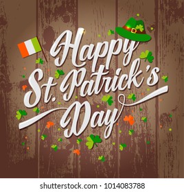 Saint Patrick’s day background on wooden texture
