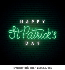 Saint Patrick’s Day neon sign. Shiny lettering Happy St. Patrick’s Day on dark brick wall background. Stock vector illustration.
