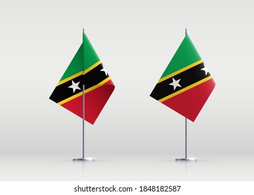 Saint Kitts and Nevis flag state symbol isolated on background national banner. Greeting card National Independence Day of the Federation Saint Christopher and Nevis. banner with realistic state flag.