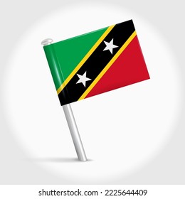 Saint Kitts and Nevis map pin flag icon. Saint Christopher and Nevis pennant map marker on a metal needle. 3D realistic vector illustration.