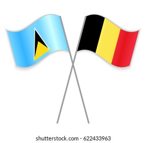 Saint Lucian and Belgian crossed flags. Saint Lucia combined with Belgium isolated on white. Language learning, international business or travel concept.