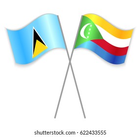 Saint Lucian and Comoran crossed flags. Saint Lucia combined with Comoros isolated on white. Language learning, international business or travel concept.