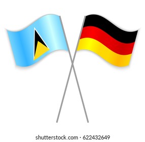 Saint Lucian and German crossed flags. Saint Lucia combined with Germany isolated on white. Language learning, international business or travel concept.