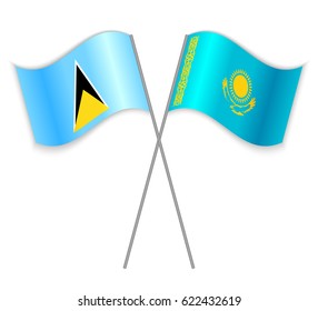 Saint Lucian and Kazakh crossed flags. Saint Lucia combined with Kazakhstan isolated on white. Language learning, international business or travel concept.