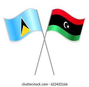 Saint Lucian and Libyan crossed flags. Saint Lucia combined with Libya isolated on white. Language learning, international business or travel concept.