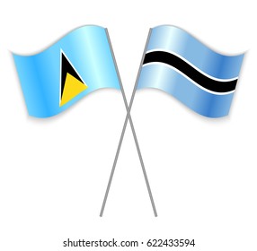 Saint Lucian and Motswana crossed flags. Saint Lucia combined with Botswana isolated on white. Language learning, international business or travel concept.