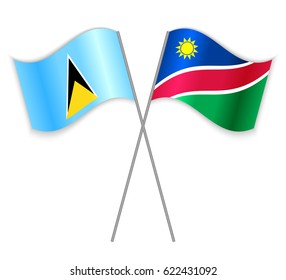 Saint Lucian and Namibian crossed flags. Saint Lucia combined with Namibia isolated on white. Language learning, international business or travel concept.