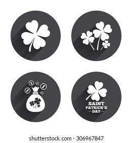 Saint Patrick day icons. Money bag with clovers and coins sign. Symbol of good luck. Circles buttons with long flat shadow. Vector