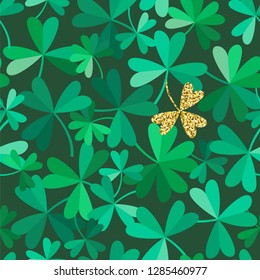 Saint Patrick's day background. Seamless vector pattern with lucky golden clover and trefoil.