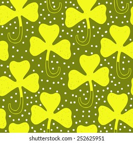 Saint Patrick's day background. Seamless vector clover shamrock pattern. Hand drawn.