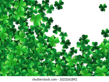 Saint Patricks day background with sprayed clover leaves or shamrocks