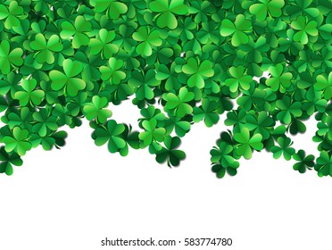 Saint Patricks day background with sprayed clover leaves or shamrocks