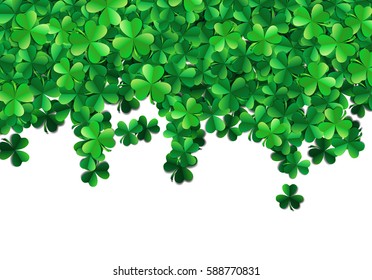 Saint Patricks day background with sprayed clover leaves or shamrocks