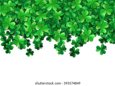 Saint Patricks day background with sprayed clover leaves or shamrocks