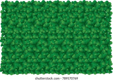 Saint Patricks day background with sprayed clover leaves or shamrocks