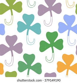 Saint Patrick's day colorful background. Seamless vector clover shamrock pattern. Hand drawn.