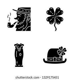 Saint Patrick's Day glyph icons set. Silhouette symbols. Feast of St. Patrick. Bowler hat, leprechaun with pipe, glass of ale, four leaf clover. Vector isolated illustration