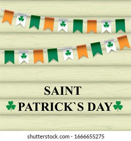 Saint Patrick's Day greeting cad. Irish holiday concept. Illustration of a garland of orange, white with clover leaf, green flags on a wooden background. Festive template poster, banner