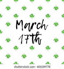 Saint Patrick's Day greeting card with sparkled green clover leaves and text. Inscription - March 17th