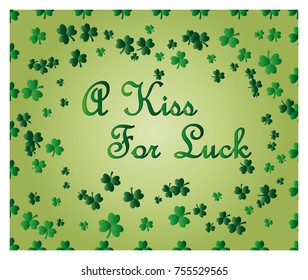 Saint Patrick's Day greeting card with sparkled green clover leaves and text. Inscription - A Kiss For Luck