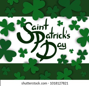 Saint Patrick's Day hand drawn lettering with green borders and clovers