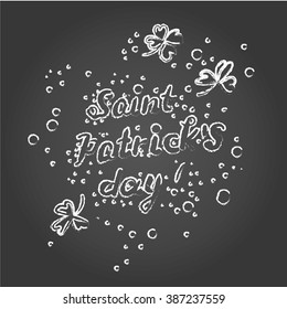 Saint Patrick's day hand writing on chalkboard. Vector illustration.