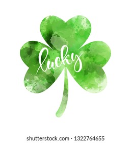 Saint Patrick's day - Irish holiday symbol. Abstract watercolor green clover leaf. Lucky - handwritten modern calligraphy message.