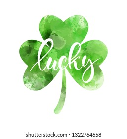 Saint Patrick's day - Irish holiday symbol. Abstract watercolor green clover leaf. Lucky - handwritten modern calligraphy message.