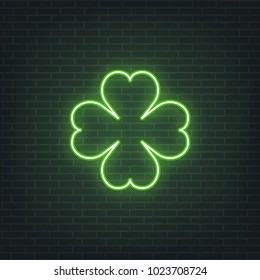 Saint Patrick's Day. Neon glowing sign of four leaves clover leaf. Saint Patrick neon set