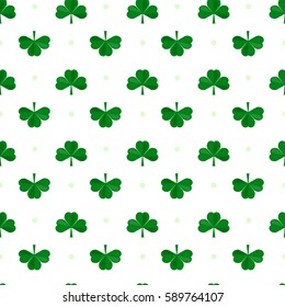 Saint Patricks Day patterns . White pattern with green clover. Vector illustration