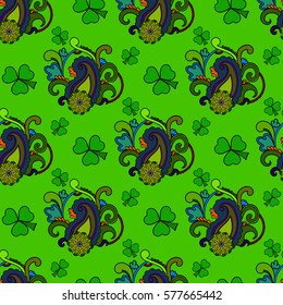 Saint Patrick's day seamless background, colorful holiday pattern with paisley and clovers, floral and ethnic theme