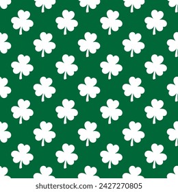 Saint Patricks Day shamrock seamless pattern. Green clover leaves on white background. St. Patricks Day backdrop. Vector template for fabric, textile, wallpaper, wrapping paper, etc