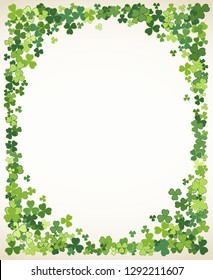 Saint Patrick's Day vector frame with small green trefoil clover shamrock leaves. Irish festival celebration greeting card design background. Nature floral spring backdrop.