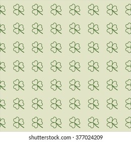 Saint Patrick's Day vector seamless pattern with green contour clover.Festive Endless template for wrapping, decoration, banner and advertisement backdrop. Ecological nature wallpaper with green leafs