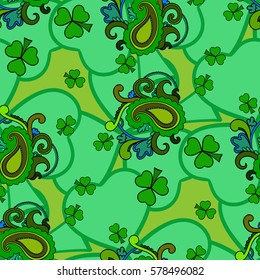 Saint Patrick's day vector seamless background, green holiday pattern with paisley and clovers, floral and ethnic theme