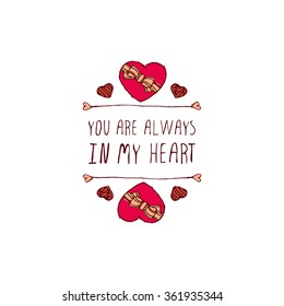 Saint Valentine's day greeting card.  You are always in my heart. Typographic banner with text and doodle heart shaped chocolate candies. Vector handdrawn badge.