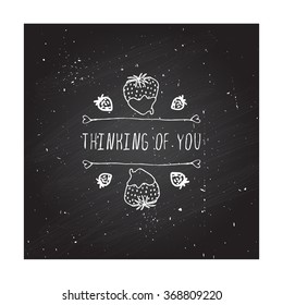 Saint Valentines day greeting card.  Thinking of you. Typographic banner with doodle heart shaped chocolate covered strawberries on chalkboard background. 