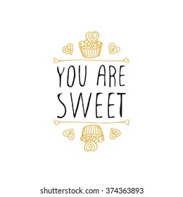 Saint Valentines day greeting card.  You are sweet. Typographic banner with doodle heart shaped cookies and cupcakes on white background. Vector handdrawn badge.