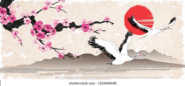 Sakura branch and flying herons on a background of Mount Fuji against the sun